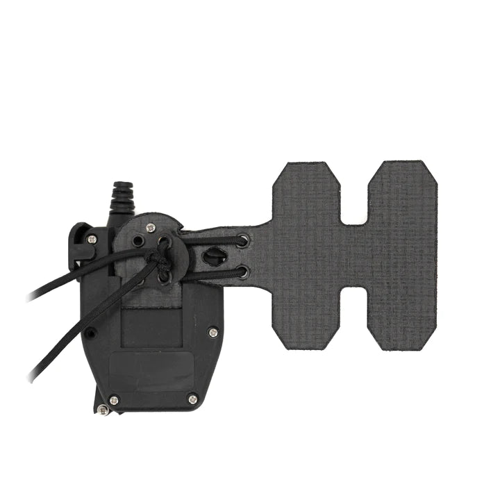 P/N: 14103-TBD: The CommSled mounts the PTT offset to the carrier and flexibly allows clearance of ATAK and similar systems, as well as lower profile mounting and improved access to PTT controls. Using shockcord, the CommSled pulls the PTT's outer edge into the plate carrier's intercostal space and keeps it spaced so that EUD devices can be used without interference by larger PTTs.